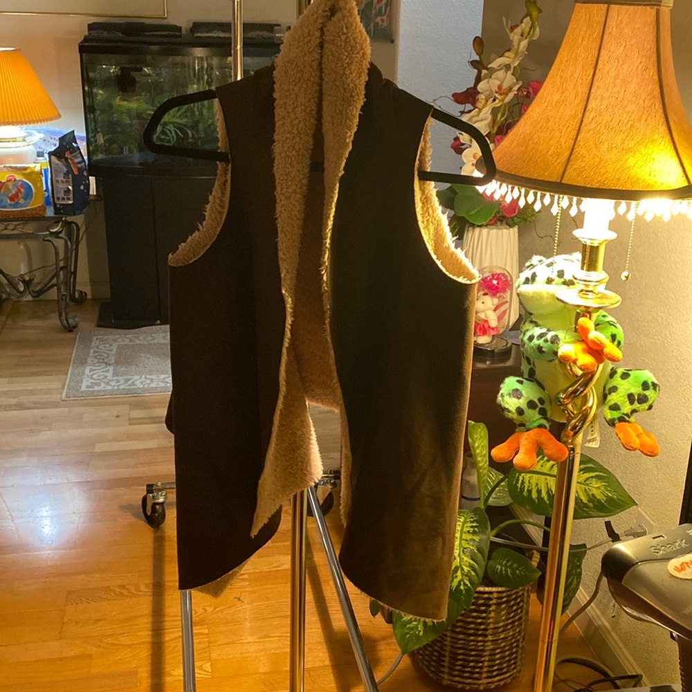 Brown lite leather with soft fur lining vest.